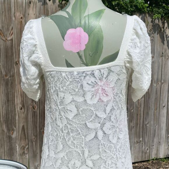 Elegant Zara dress features a unique knotted round neckline and charming - Picture 8 of 9